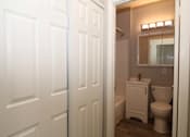 Thumbnail 16 of 59 - a bathroom with a toilet and a white door