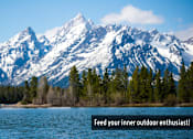 Thumbnail 17 of 17 - two people in a canoe on a lake with mountains in the background