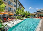 Thumbnail 12 of 19 - A large swimming pool at Infinity on Yorktown, Dallas