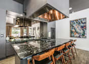 Thumbnail 8 of 19 - Island Kitchen at Infinity on Yorktown, Texas, 75208