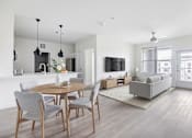 Thumbnail 15 of 17 - A modern dining room with a round table and grey chairs at 901 Rendon, Burleson, TX 76028