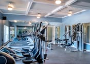 Thumbnail 8 of 30 - a row of exercise bikes in a gym at Infinity on the Mark, Dallas, 75243