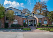 Thumbnail 1 of 30 - the front of a house with a driveway in front of it at Infinity on the Mark, Dallas, TX