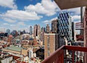Thumbnail 17 of 17 - A cityscape with a mix of modern and older buildings, viewed from a high vantage point. at The Ellington Apartments, New York, 10019