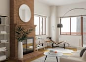 Thumbnail 12 of 17 - A living room with a fireplace and a large mirror on the wall at The Ellington Apartments, New York, 10019