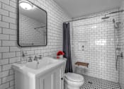 Thumbnail 3 of 12 - Tiled Bath Studio Apartment