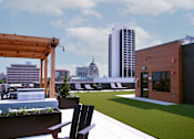 Thumbnail 39 of 52 - A wooden pergola is on a patio with a bench and a planter at The Pearl, Indiana