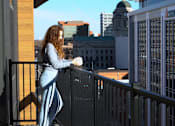 Thumbnail 29 of 52 - Girl on the balcony drinking coffee at The Pearl, Indiana