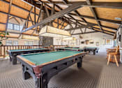 Thumbnail 38 of 42 - A room with a pool tables and a wooden ceiling at The Aspens South Coast, California, 92504