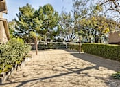Thumbnail 34 of 42 - A sand volleyball court surrounded by hedges at The Aspens South Coast, California, 92504