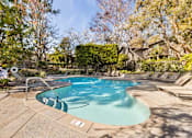 Thumbnail 35 of 42 - A small pool surrounded by trees and a fence at The Aspens South Coast, California, 92504