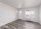 Thumbnail 2 of 8 - A room with a door and a window with blinds.