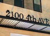 Thumbnail 82 of 88 - A building with a sign that says 2100 4th Ave.