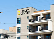 Thumbnail 69 of 88 - A building with a sign that says "Foley Center" on it.