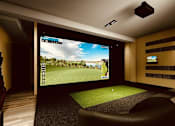 Thumbnail 3 of 88 - A modern home theater with a large screen and comfortable seating.