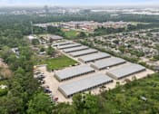 Thumbnail 6 of 11 - An aerial view of the Houston Premium Storage facility showing multiple buildings and surrounding area.