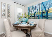 Thumbnail 26 of 35 - Table and chairat Royal Wildewood Manor Apartments, Clute, TX, 77531