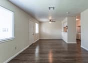 Thumbnail 19 of 26 - Living And Kitchen at Castlewood Apartments, Texas