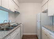 Thumbnail 20 of 26 - Sink With Faucet at Castlewood Apartments, Texas, 77531
