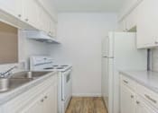 Thumbnail 21 of 26 - Kitchen at Castlewood Apartments, Clute, TX