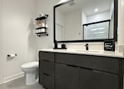 Thumbnail 9 of 22 - View of typical en-suite bathroom cabinetry & beautiful tile flooring