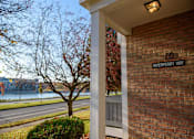 Thumbnail 23 of 32 - a brick building with a sign on the side of it