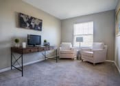 Thumbnail 9 of 27 - Interior view of second bedroom styled as a home office