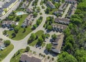 Thumbnail 25 of 27 - Exterior aerial view of Webster Woods townhomes neighborhood looking northeast