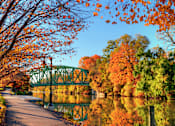 Thumbnail 29 of 29 - Image of a canal bridge and fall leaves by the Erie Canal in Pittsford NY near Westport Crossing