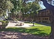 Thumbnail 3 of 11 - Camelback Properties apartments in Phoenix, AZ Grass Courtyard