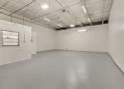 Thumbnail 22 of 29 - the interior of an empty room with white walls and a window