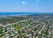 Thumbnail 6 of 29 - an aerial view of a city and the ocean