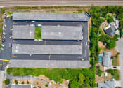 Thumbnail 8 of 29 - an aerial view of a parking lot from above