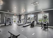 Thumbnail 41 of 60 - A spacious gym with a variety of equipment including treadmills, elliptical machines, and weight machines at Venue at 109 Apartments, Lebanon , Tennessee