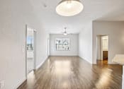 Thumbnail 20 of 60 - A spacious room with wooden floors and white walls at Venue at 109 Apartments, Lebanon 