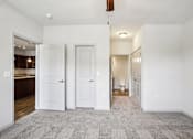 Thumbnail 4 of 60 - A room with white walls and a grey carpet at Venue at 109 Apartments, Lebanon  37090