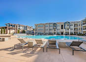 Thumbnail 27 of 44 - Pool surrounded by lounge chair at Edge and Stone, San Antonio, Texas