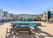 Thumbnail 30 of 44 - Pool surrounded by chairs at Edge and Stone, San Antonio