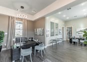 Thumbnail 33 of 38 - A modern home office with a desk, chairs, and a computer at Prosper Madison Oaks, Madison, AL