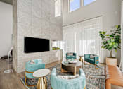 Thumbnail 9 of 44 - Lounge Area with TV at Edge and Stone, San Antonio, Texas
