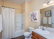 Thumbnail 12 of 25 - Bathroom with a Toilet at Mill Creek Run Apartments, Macon, Georgia