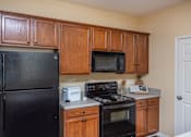 Thumbnail 3 of 25 - Kitchen With Ample Storage at Mill Creek Run Apartments, Macon, 31216