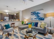 Thumbnail 5 of 19 - a living room with a couch and a table at The Mark, San Antonio Texas