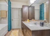 Thumbnail 7 of 19 - a bathroom with a sink and a mirror at The Mark, Texas