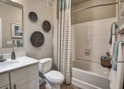 Thumbnail 14 of 14 - a bathroom with a sink toilet and a bath tub at Sterling Creek, Richmond Hill Georgia