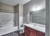 Thumbnail 10 of 10 - a bathroom with a sink toilet and a shower at Mill Creek Run, Macon, 31216