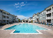 Thumbnail 18 of 74 - A large swimming pool in front of apartment at Waterleaf at Neely Ferry Apartments, Simpsonville