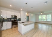 Thumbnail 49 of 50 - Living and kitchen at Legacy at Cibolo, Boerne, TX