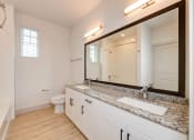 Thumbnail 12 of 50 - a bathroom with a sink and a mirror and a toilet at Legacy at Cibolo, Boerne, TX, 78006