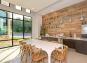 Thumbnail 41 of 50 - a dining room with a white table and chairs at Legacy at Cibolo, Texas